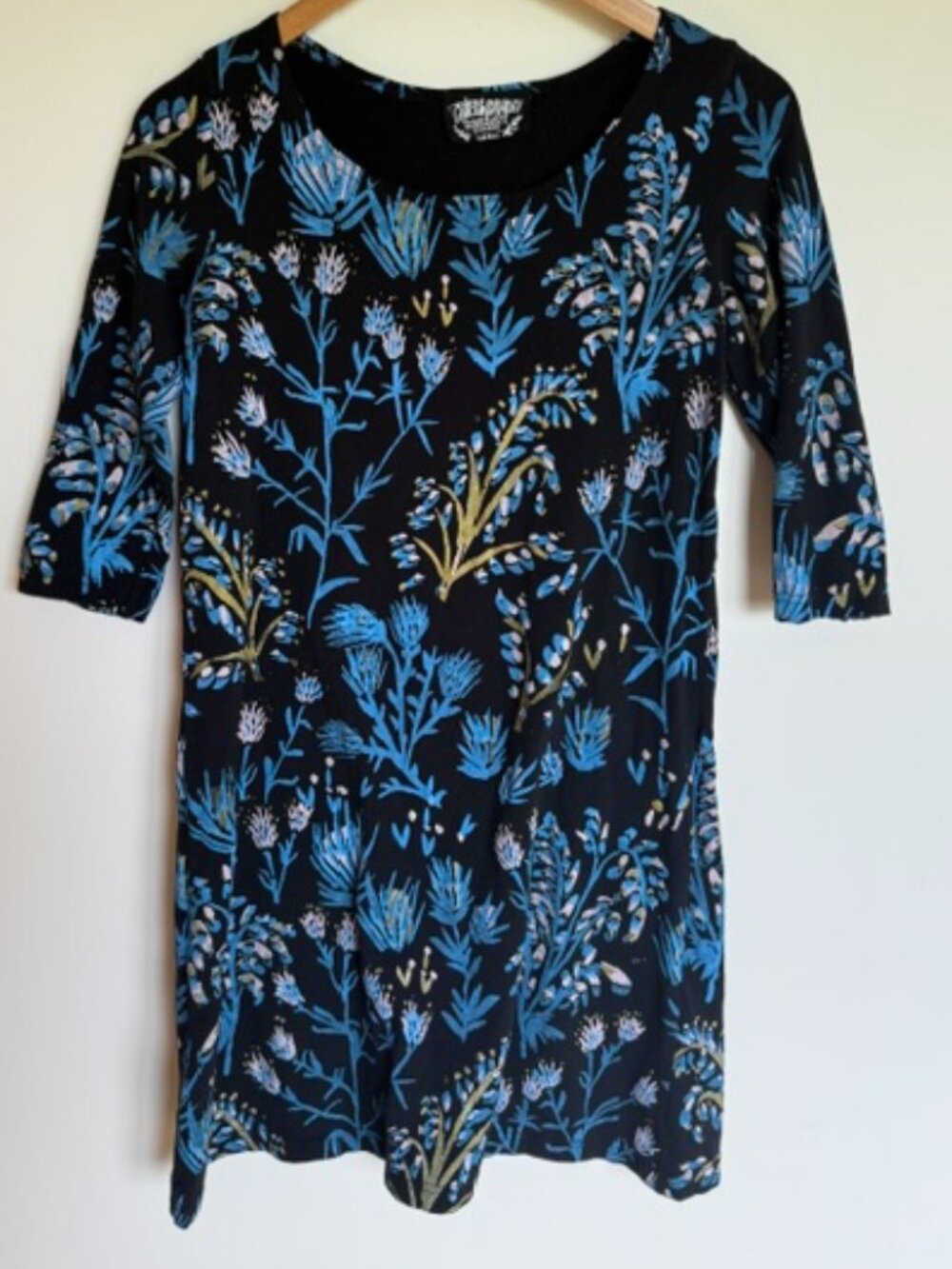 Thief and Bandit dress with vibrant floral print.